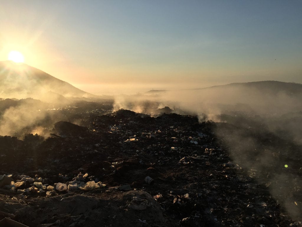 The vertedero landfill of Buena Vista and Los Barriles burns through the night, sending smoke into homes down below.