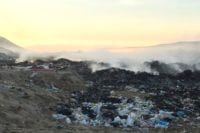 Plastics, tires, aerosols and other waste burn, creating smoke with severe health risks.